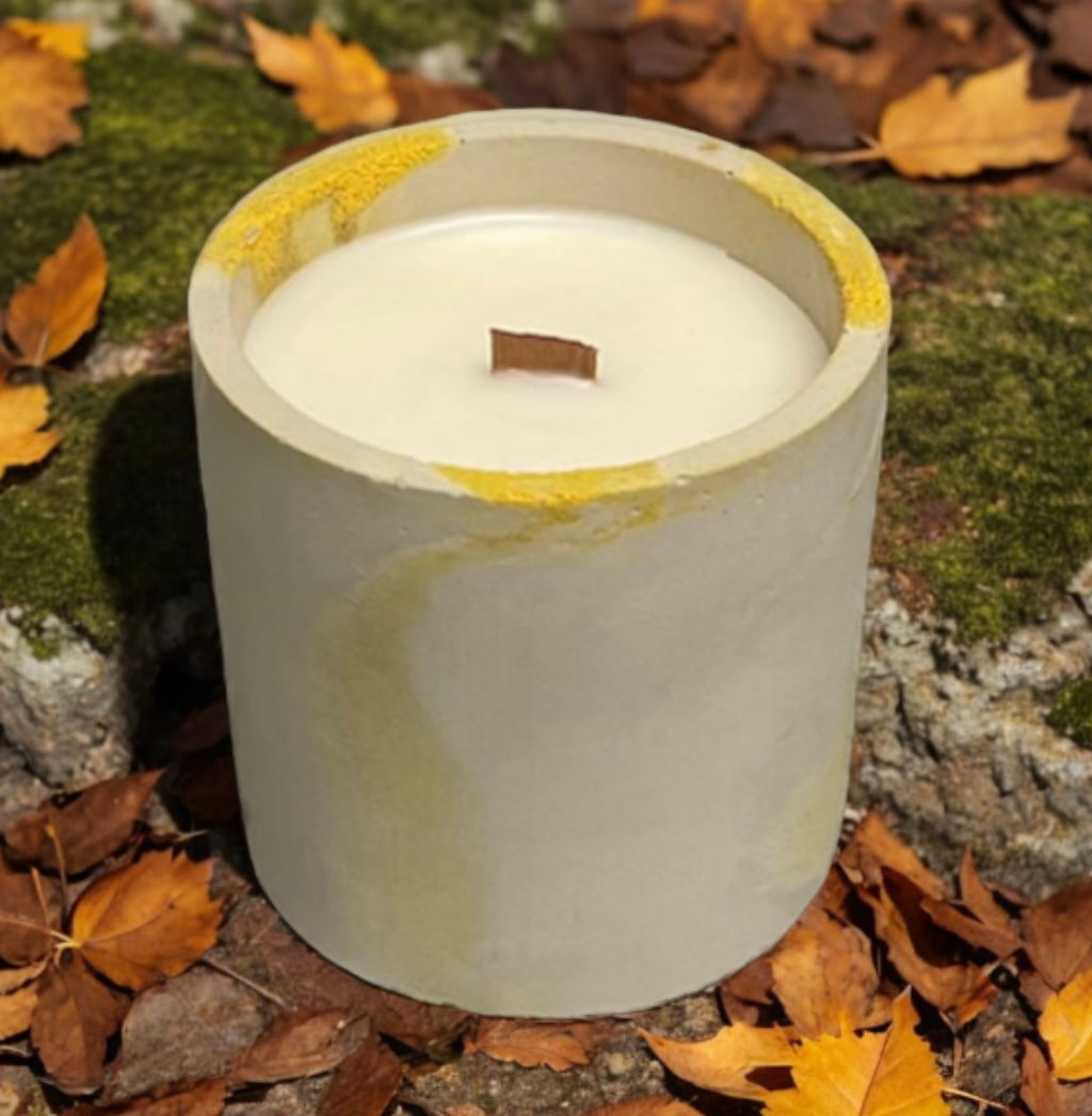 Hansel and Gretel candle in a yellow cement vessel